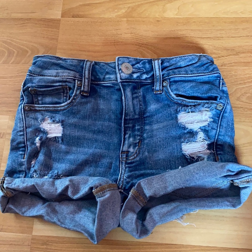 Blue ripped jean shorts